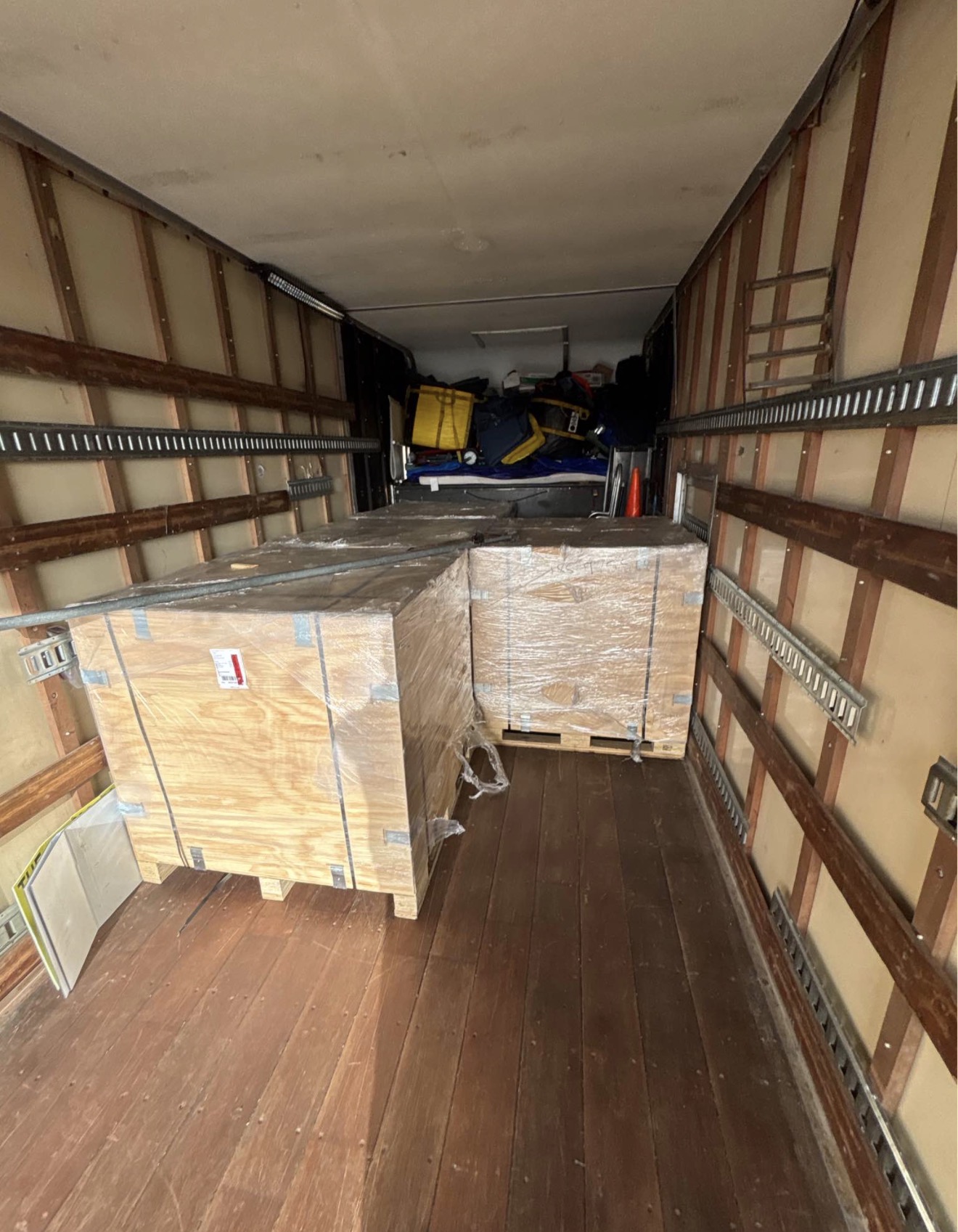 Crated freight secured in box truck